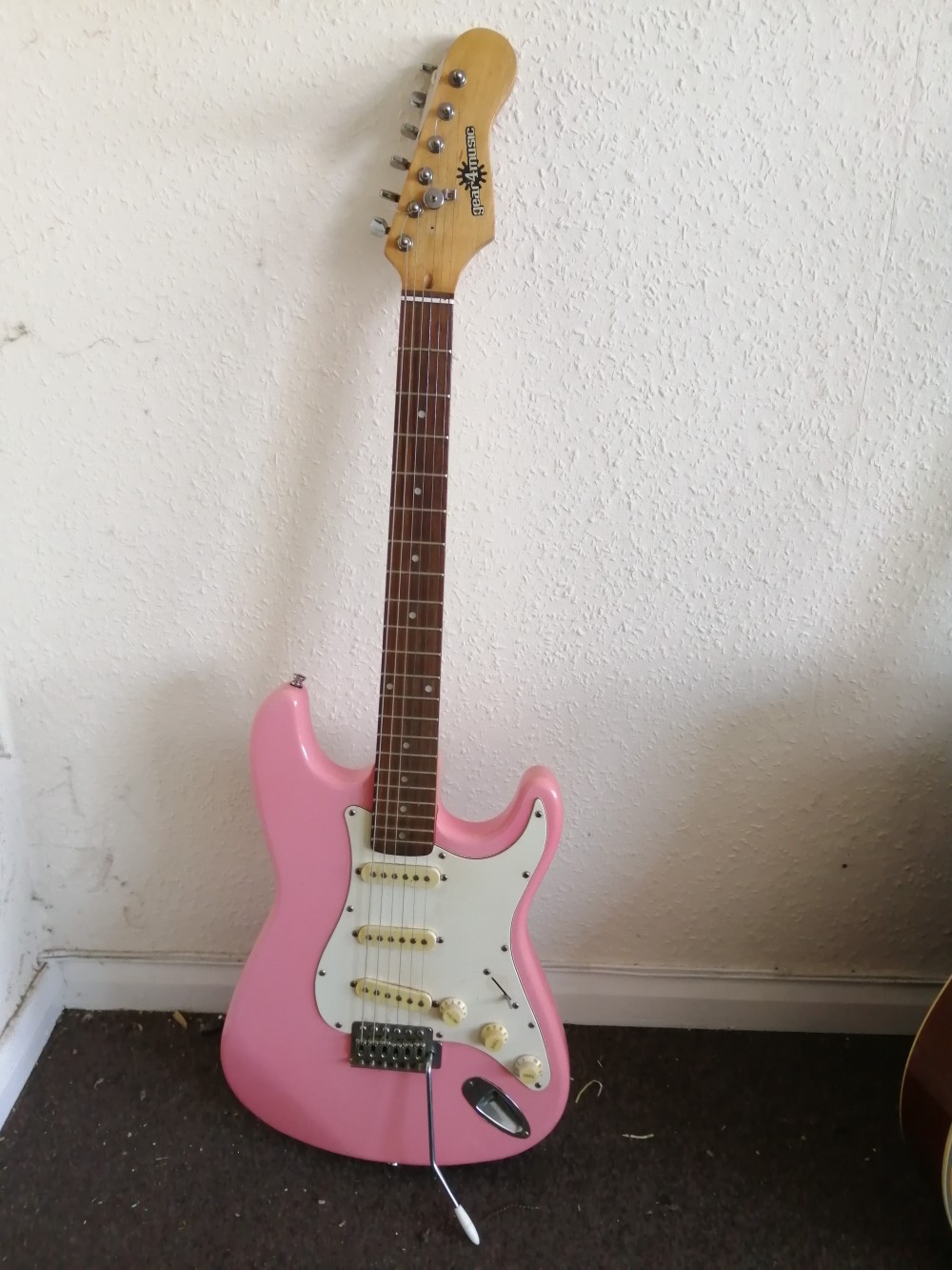 A Gear 4 Music Strat-style electric guitar